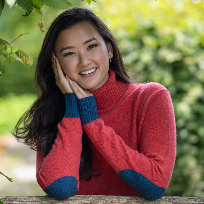 Women's Roll Neck Jumper in Cashmere/Merino - Burnt Coral with Navy